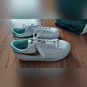 Nike White and Metallic Sneakers